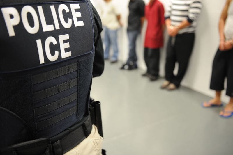 ICE ERO arrested more than 3,100 convicted criminal aliens, fugitives and immigration violators in a six-day nationwide enforcement action. In this photo an UCE agents watch over arrestees in Miami.