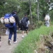 En su retorno, en vez de atravesar la selva del Darién, los migrantes toman ahora embarcaciones en puertos del Caribe panameño hasta una población fronteriza con Colombia